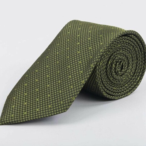 Аренда зеленого галстука с узором для мужского костюма